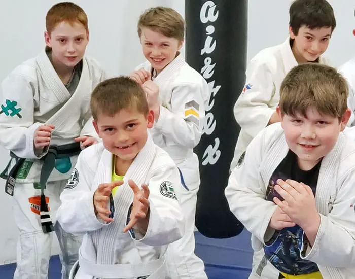 Children training in a kids Brazilian Jiu-Jitsu class at Maple Jiu-Jitsu Academy